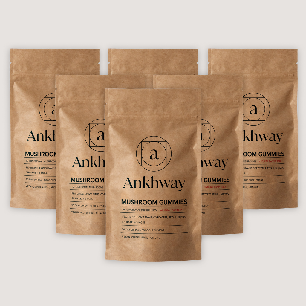 Bags of Ankhway mushroom gummies in brown paper packaging.