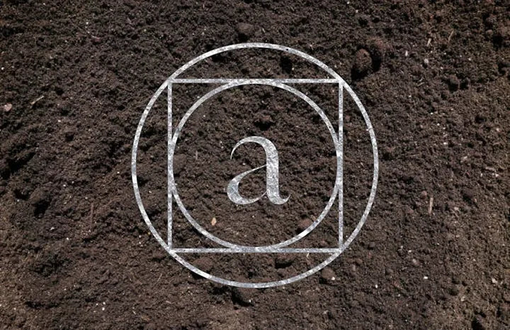 The Ankhway monogram on dark soil